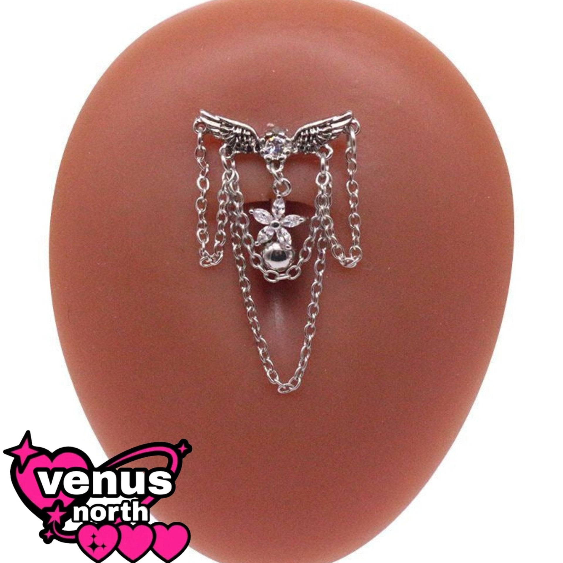 Angel wing chain draped navel piercing
